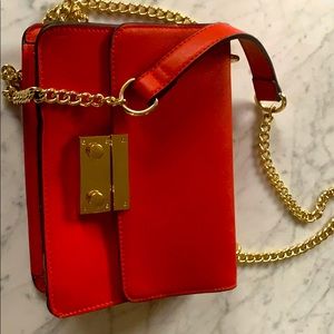 BCBGeberation red leather clutch